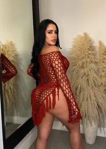 Full view of sexy red handmade crochet mesh beach dress featuring trendy fringe details
