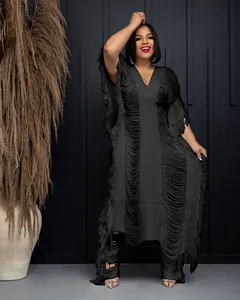 Elegant black handmade knit hollow maxi dress featuring long fringe detail and V-neck