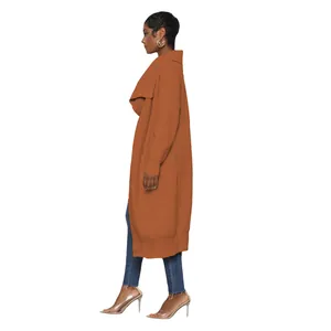 Side profile of a women's long burnt orange knit cardigan with wide lapel collar detail