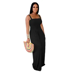 Casual black wide-leg sleeveless jumpsuit with smocked bodice and thin straps detail view