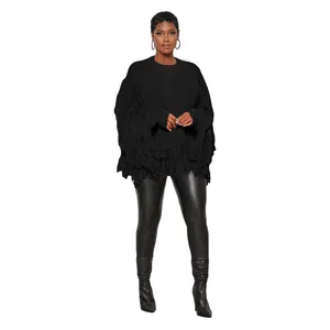 Detailed view of women's black knit cardigan featuring heavy fringe styling and open front