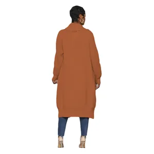 Back view of a long orange knitted cardigan for women featuring a cozy ribbed texture.