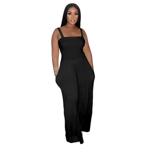 Elegant black smocked wide-leg jumpsuit with spaghetti straps for chic casual style