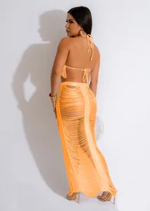 Set da spiaggia sexy arancione con frange, due pezzi con top e gonna lunga