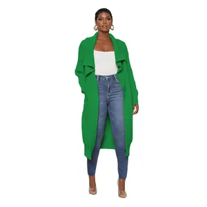 Full-length view of a green ribbed knit cardigan on a model with white background