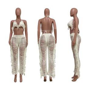Vue sous trois angles du bikini tricoté crème et pantalon de plage