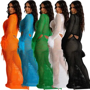 Sexy women's hollow-out knit crochet maxi beach dress with waist cut-outs and tassels