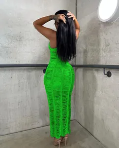 Detailed back view of a neon green knitted hollow-out sleeveless beach maxi dress