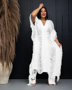 Detailed view of white handmade knit hollow fringe set on model