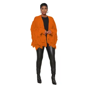 Vibrant orange knitted cardigan featuring heavy fringe details in a stylish cropped design
