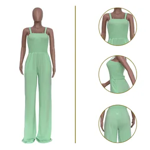 Detail view of mint green smocked jumpsuit showing front, side and back close-ups