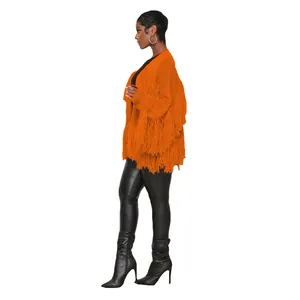 Side view of vibrant orange knit cardigan featuring layered fringe detailing and open front