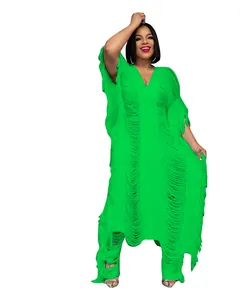Detailed view of the bright green handmade hollow-out fringe knitted two-piece set