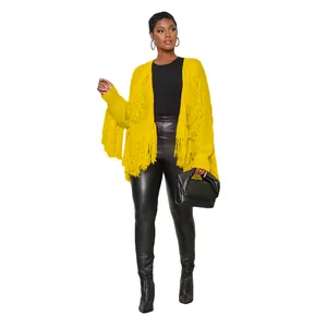Detailed view of women's yellow knit cardigan with stylish fringe accents