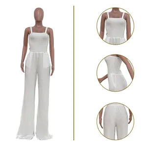 Multi-angle details of white smocked jumpsuit showing fabric texture and fit.