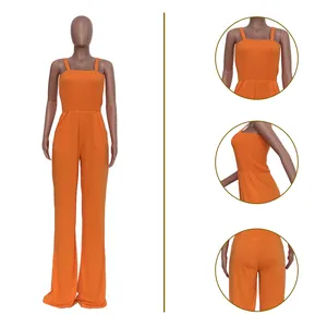 Professional detailed view of an orange smocked bodice wide leg jumpsuit with straps