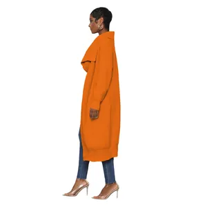 Side view of a bright orange long knitted open front cardigan sweater for women.