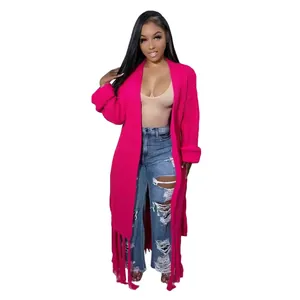 Stylish long fuchsia knitted cardigan for women featuring trendy tassel hem detail