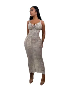 Full detail showing the intricate knit hollow-out texture of this maxi beach dress
