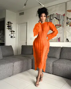 Elegant orange cable-knit midi dress with stylish fringe detailing and crew neck