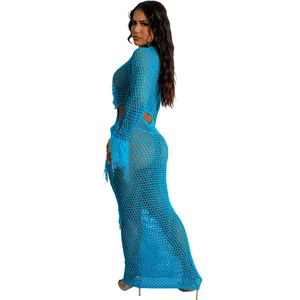 Side view of bright blue crochet knit beach maxi dress with fringe sleeves