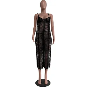 Close-up of black knitted hollow strap maxi dress with horizontal stripe pattern