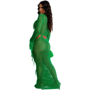 Back view of a green knitted hollow-out maxi beach dress with tassel sleeve details