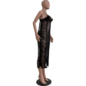 Side view of a black hollow-out knit camisole beach dress