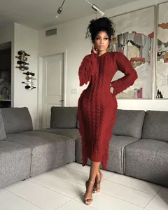Elegant wine red cable-knit dress with long fringe hem detail