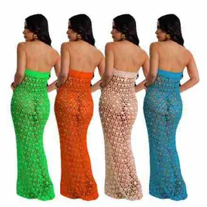 Back view of knitted sequin hollow beach dresses in four vibrant colors