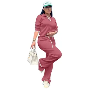 Ensemble deux pièces en tricot pour femme avec haut polo et pantalon large mauve rosé