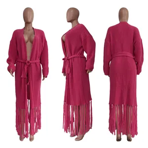 Detailed views of rose red knit cardigan with long fringes and tie-waist belt.