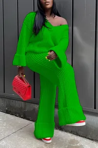 Vibrant green rib-knit two-piece set featuring off-shoulder top and wide-leg trousers.