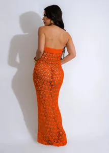 Back view of orange crochet sequined hollow-out beach maxi dress with strapless design
