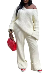 Detailed view of women's white ribbed knit lounge set with oversized sweater and pants