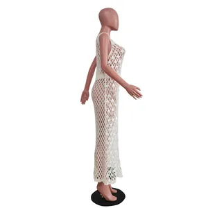 Side view detail of white crochet sequin beach dress on a mannequin