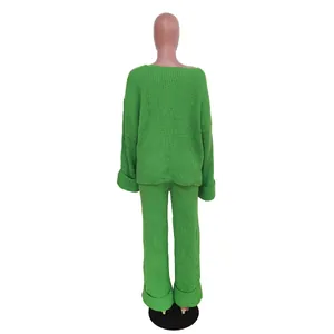 Back view of women's vibrant green knit two-piece set featuring a loose sweater and pants