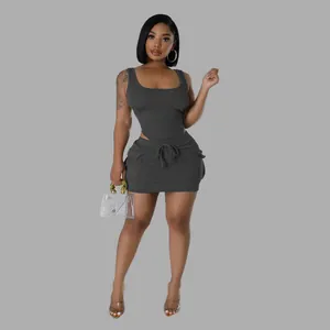 Chic two-piece ribbed knit set featuring a tank top and matching mini skirt in charcoal