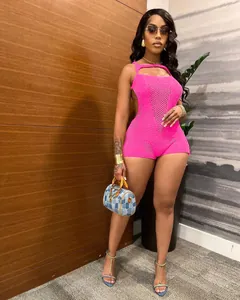 Detailed view of the vibrant pink sleeveless knitted crochet romper for women