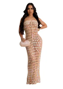 Detailed view of apricot crochet knit beach dress featuring shimmering round sequins