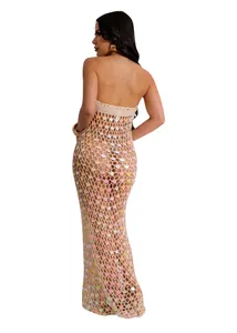Detailed back view of a sequined knit hollow beach dress for women in a stylish beige shade