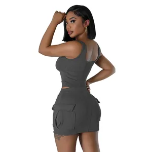 Side view of textured jacquard two-piece set with crop top and cargo pocket skirt