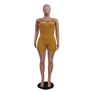 Detailed view of yellow sleeveless knitted breathable romper with mesh texture.