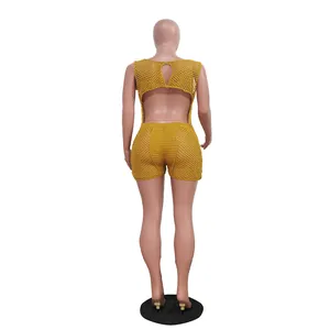 Back view of yellow crochet sleeveless jumpsuit with breathable mesh and open back design