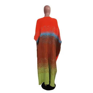 Back view of women's loose knitted long cardigan featuring vibrant color gradient design