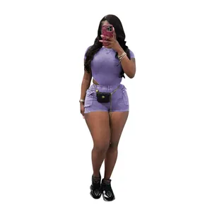 Full view of a model wearing a lavender ribbed two-piece casual shorts and crop top set