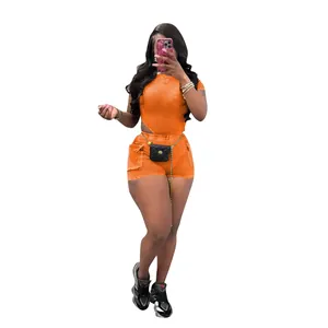 Full-body view of a vibrant orange two-piece casual ribbed set with cargo pocket shorts