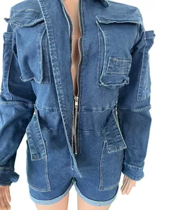 Detailed view of women's casual washed blue denim long sleeve romper with front zipper and pockets