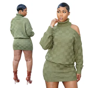 Detailed view of women's olive green checkered knit two-piece sweater and skirt set