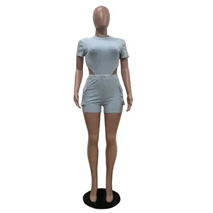 Close-up detail view of light blue women's two-piece casual shorts set with cut-out top